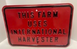 THIS FARM USES INTERNATIONAL HARVESTER SIGN