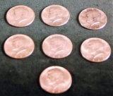 Lot of 7 1964 Kennedy Half Dollars. (ALL UNC).