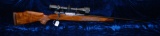 Golden Eagle Model 7000 7 mm REM MAG Bolt Action Rifle w/ Bushnell Wide Angle Scope.