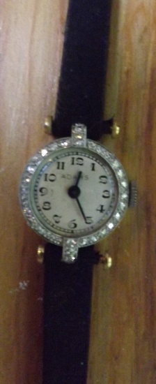 Adams platinum Ladies Wrist Watch With (30) Diamonds On Bezel. Estimated 1/3 Carat Weight Diamonds