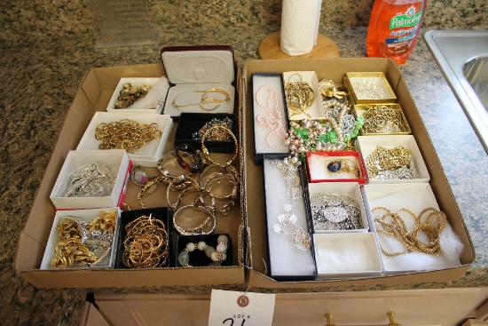 2 Boxes Of Costumes Jewelry