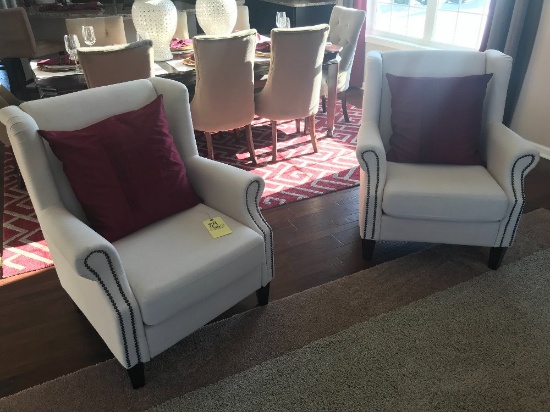 (2) upholstered nail-head trim chairs with pillows