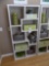 White Bookshelf with Decor and Storage Boxes