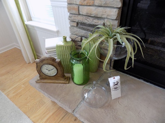 Clock, Green Vases, Books, and Stemmed Vase