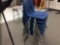 Seven stacking student chairs