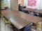 Four cafeteria style tables, 24 chairs