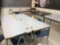 10 tables, 19 chairs, five students, teachers desk. Contents are not included