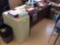 Teachers desk, two file cabinets, computer desk, table with six chairs, bookshelf