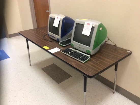 Two tables and 2 iMac computers