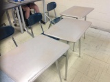 Four student desk, table, two chairs, student desk