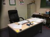 Three teacher's desks, two tables, two file cabinets, contents are not included