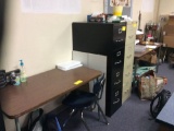 Four tables, teachers desk, four chairs, two files, for bookshelves, overhead screen