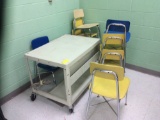 Four tables, 10 chairs, three file organizers, AV cart with TV, bookcase, content are not included