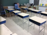 28 student desks and chairs