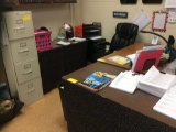 Teachers desk, files, three tables, two bookcases, overhead projector. Contents not included