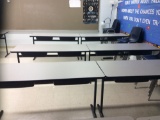 15 tables and 30 student chairs.