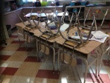 25 student desks and chairs.