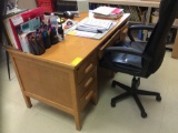 Teachers desk, bookshelf, two stands, chair. Contents are not included