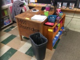 Teachers desk, bookshelf, two tables, 11 chairs. Contents are not included