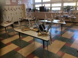 10 student tables and 25 chairs.
