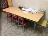 14 student chairs and five tables. Contents are not included