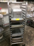 Kitchen cart with trays and fry baskets.