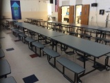 Six cafeteria tables.