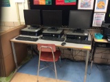 3 Tables, 6 chairs, teachers desk, office chair, 3 computers, student desk. (contents not included)