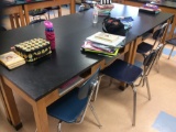 14 student tables and 28 chairs  (contents not included)