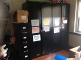 2 Metal Cabinets, 2 files, teachers desk, 3 tables, 6 chairs,  (contents not included)