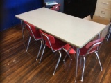 7 student tables, 22 chairs  (contents not included)