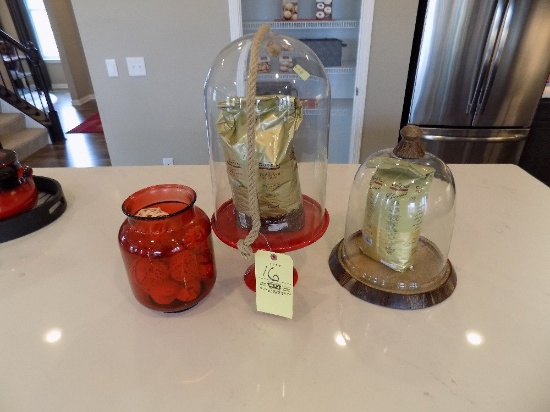 Glass containers and red jar