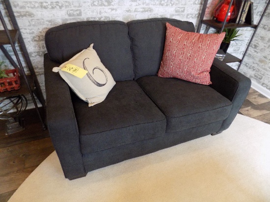 Two-cushion sofa with accent pillows