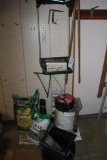 Trash bag cart, 50' hose, plastic sheeting & potting soil