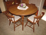 Dinette table w/6 chairs and two extra leaves