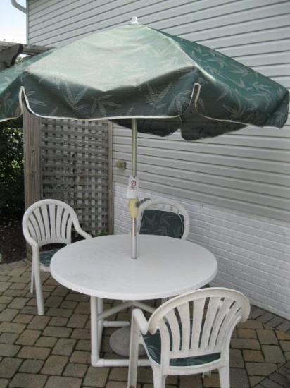 Plastic patio table with umbrella