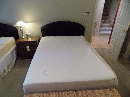 Full size bed with padded headboard