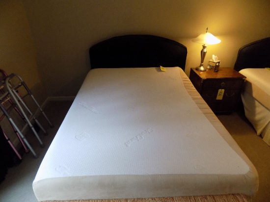 Full size bed with padded headboard