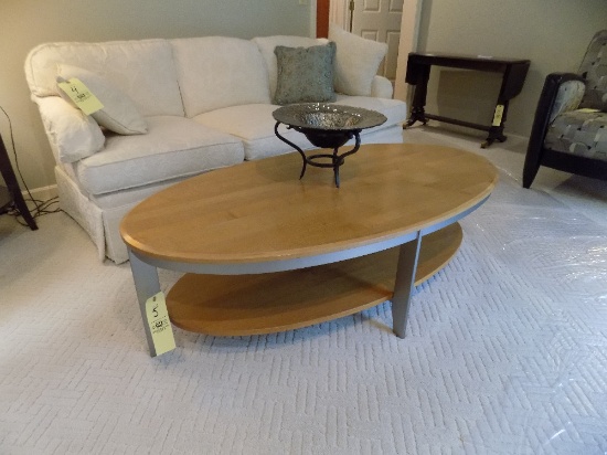 Metal-framed oval coffee table