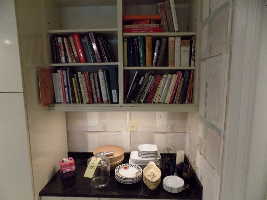 Cookbooks, Crate & Barrel dishes, Pfaltzgraff bowls, and clear jar