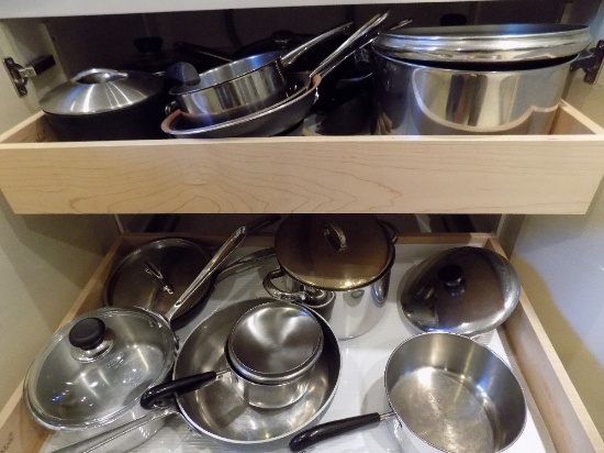 3 cabinets of pots, pans ,and cutting boards