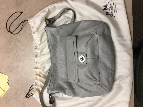 Grey Coach purse with slip
