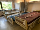 4 Hill-Rom Hospital Beds - 4 Overbed Tables