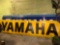 Yellow Yamaha Sign