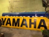 Yellow Yamaha Sign