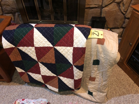 quilt rack with 2 large comforter quilts