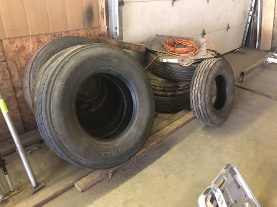 7 used tires and mud flaps