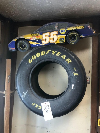 Stock car tire and model car.