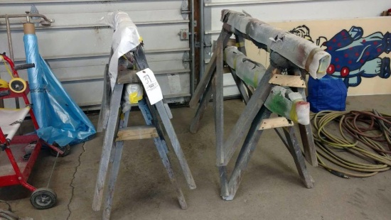 Two pair of wooden painting stands.