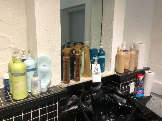 Assorted Used Shampoos and Conditioners